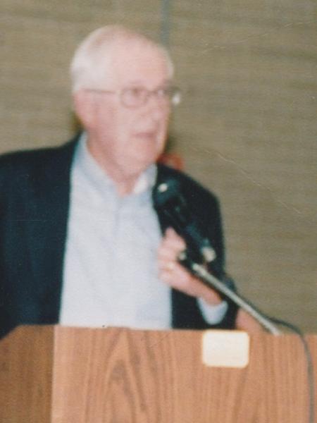 Bill Fisher at podium.